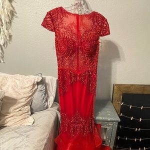 Bright Red Jovani Gown this dress has the stones missing but in great condition